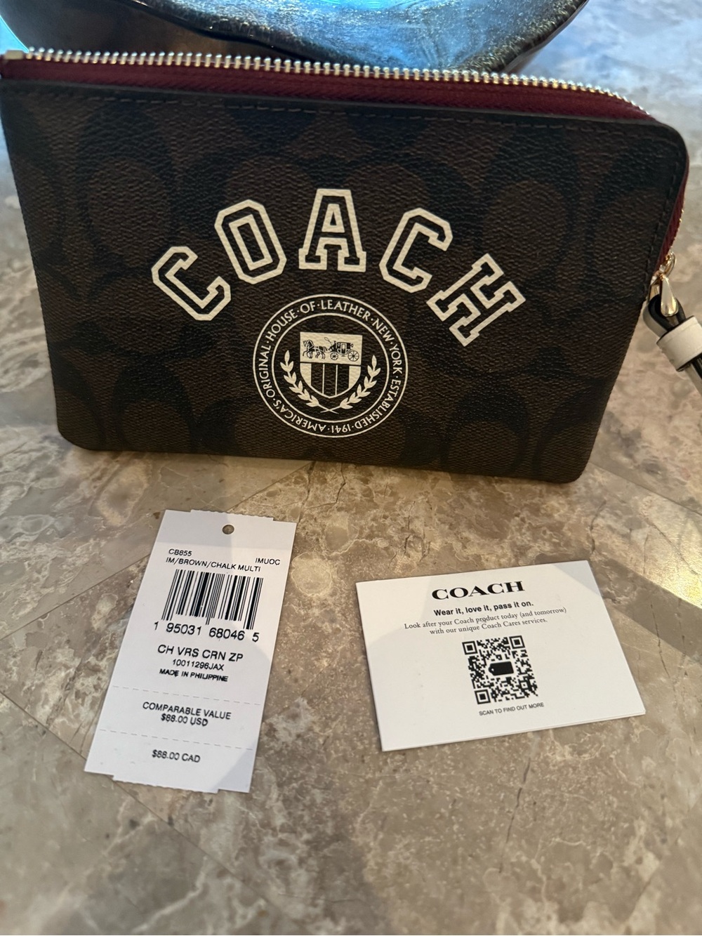 Coach Brown Corner Zip Wristlet in Signature Canvas with a Varsity Motif